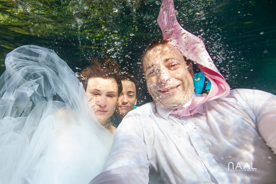 underwater wedding photographer, bride and groom