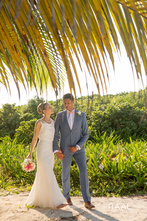 Bride and groom at Blue Venado beach Club by Naal Wedding Photography