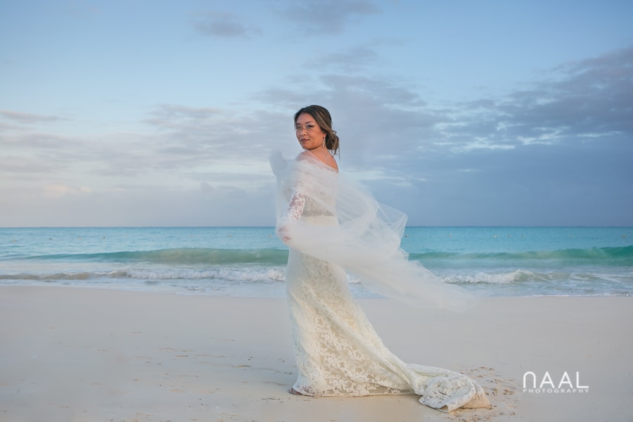Bride at the beach. Belmond Maroma by Naal Wedding Photography