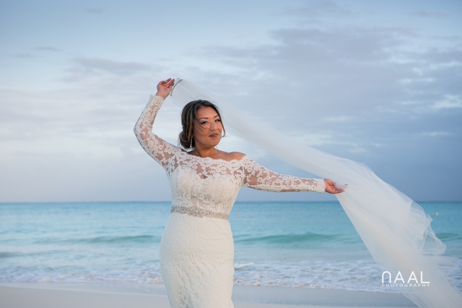 Bride at the beach. Belmond Maroma by Naal Wedding Photography
