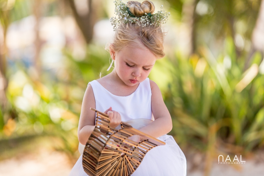 flower girl at riu palace mexico destination wedding by Naal Wedding Photography